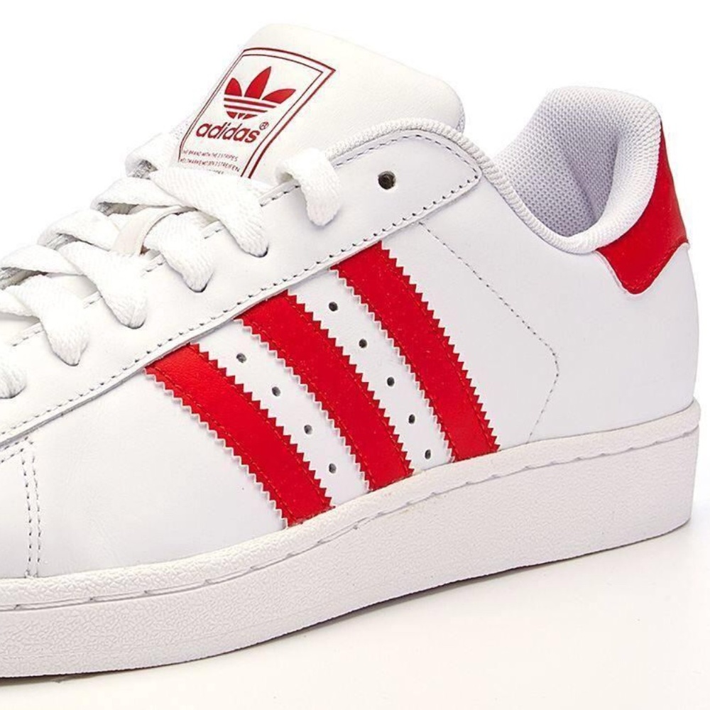 White and red adidas shell top low top